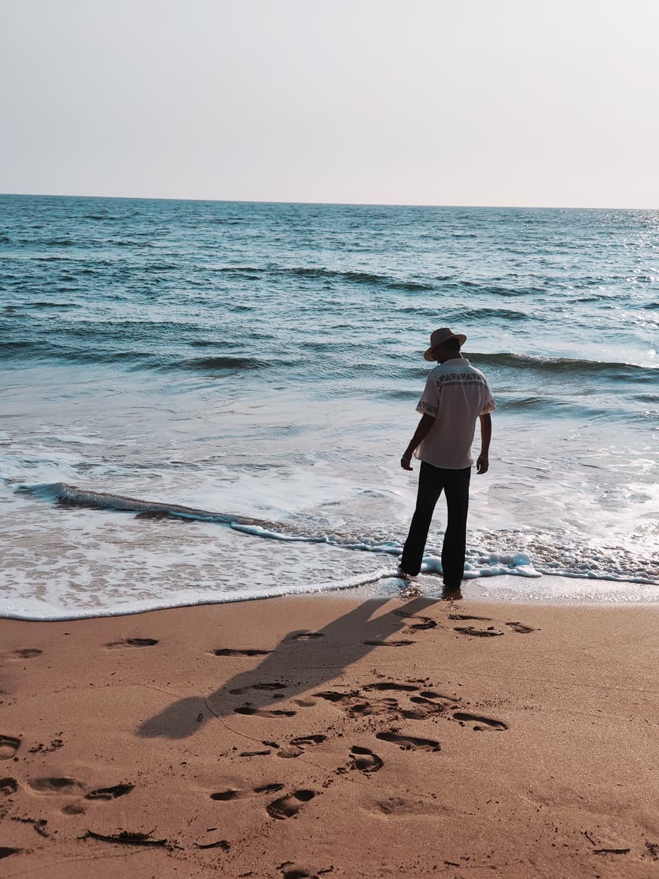 Jaideep standing at the edge of the sea